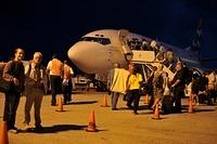 Wolf and Franz in front of plane to Cayman Brac